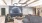 living area that includes ample seating spaces and bright lighting