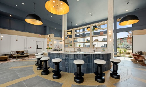 The essence of exceptional living large bar with stools surrounding it