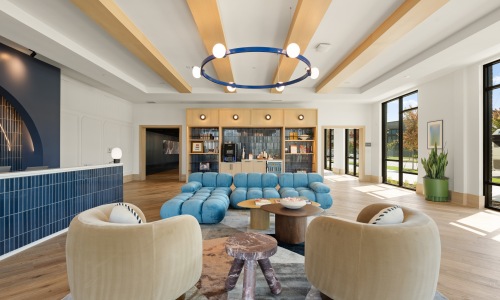 Access to resident-only features room with couch and chairs